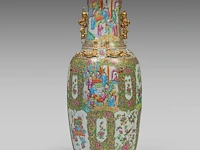 A chinese canton famille rose 'court scenes' large vase, paired with large recumbent lions handles, 19thc, h 88,5 cm