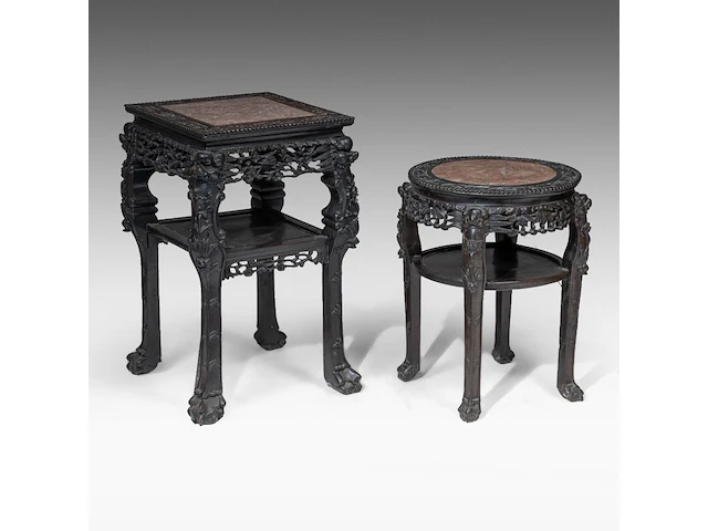 A chinese carved hardwood round stand and a square stand, late qing, h 65 cm (round) / h 81 cm (square) - afbeelding 1 van  6