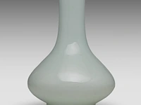 A chinese celadon-glazed bottle vase, with an effaced mark (presumably), h 33 cm