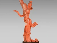 A chinese coral carving of a dancing lady, fixed on a wooden base, total weight 1040 g