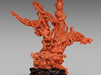 A chinese coral carving of guanyin on a dragon, republic period, (coral only) weight about 813 g - l 23,5 x h 22,5 cm