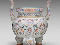 A chinese famille rose ‘buddhist emblem’ tripod censer, with a qianlong mark, total h 27 cm