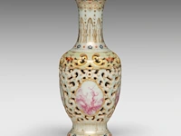 A chinese famille rose double-walled vase, open work with stylised dragon pattern, with a qianlong mark, h 23,5 cm
