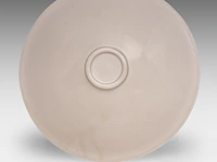 A chinese incised ding ware ‘lotus leaf’ conical bowl, l 13,5 - h 3,8 cm