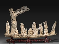 A chinese ivory sculpture of immortals in a boat, late qing dynasty (1850-1912), l 73 cm - total h 53 cm - ivory h 45 cm - ca. 7500g (+)