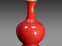 A chinese monochrome coral-red glazed bottle vase, with a qianlong mark, fixed with lamp mounts, total h 44 cm
