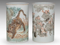 A chinese qianjiang cai 'tiger' and a grisaille 'eighteen luohan' brushpot, one with a daoguang mark, h 11,3 cm