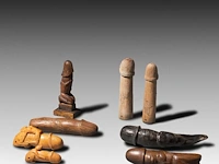 A collection of 9 thai palad khik phallic amulets, h 17 cm (tallest)