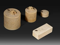 A collection of fine ivory art nouveau boxes with decoration of irises, all carrying the initials w.b., ca. 1900, ø 8 cm - 164g / ø 5,5 cm - 90g / w 9 cm - 52g / ø 4 cm - 28g (+)