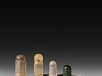 A collection of five rock crystal lingams, khmer, cambodia, h 5,5 cm (tallest)