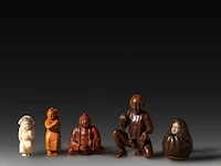 A collection of five wooden and bone erotic netsukes and okimonos, meiji, japan, h 7 cm (tallest)