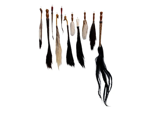 A collection of flyswats from various animal tails - afbeelding 1 van  1