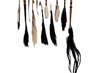 A collection of flyswats from various animal tails