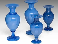 A collection of four decorative blue opaline glass vases smallest pair: 18.5 cm. (7.28 in.), tallest pair: 24.5 cm. (9.65 in.)