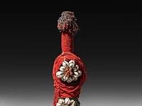 A collection of kapssiki 'cache sexe', penis sheaths, and a fertility doll - afbeelding 5 van  7