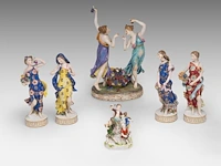A collection of polychrome saxony porcelain figurine groups, h 29 cm (tallest)