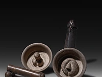 A collection of southeast asian fertility items, bhutan and others, h 23,5 cm (tallest)