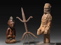 A collection of three african tribal fertility items, h 29 cm (tallest)