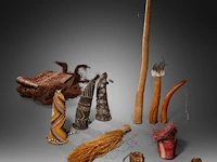 A collection of various penis sheaths, indonesia, and a papuan apron, l 72 cm (the largest sheath)