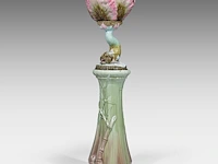 A delphin massier (1836-1907) stand matched with a polychrome eichwald jardinière on a dolphin base, total h: 137 cm
