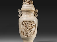 A fine chinese ivory sculpted vase, decorated with cranes in a forest landscape, and birds among branches, late qing dynasty (19thc), h 31 cm - w 13 cm - 1655g (+)