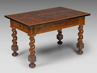 A fine dutch baroque walnut and burr centre table, decorated with star marquetry 74 x 120 x 80 cm. (29.12 x 47.24 x 31 1/2 in.)