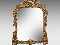 A fine french régence giltwood wall mirror, 18thc 108 x 72 cm. (42.52 x 28.35 in.)