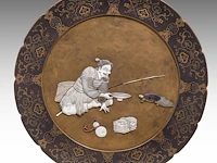 A fine lacquered panel with shibayama inlay of ivory, mother-of-pearl and coloured bone, representing an immortal with a minogame, meiji period (1868-1912), ø 45 cm - ca. 1600g (+)