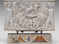 A finely carved basso-relievo carrara plaque depicting proserpina abducted by pluto, presented on a pietra dura decorated stand, 19thc plaque: 50 x 82 cm. (19.67 x 32.28 in.), with stand: 70 cm. (27.55 in.)