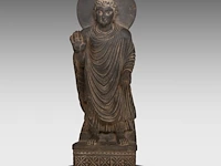 A gandhara-style grey schist figure of buddha shakyamuni, total h 66,5 cm