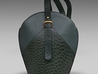 A green delvaux 'verdict' handbag in ostrich leather 37.5 cm. (14.75 in.)