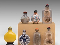 A group of seven snuff bottles, incl. a cloisonné enamelled on copper, with a qianlong mark, 20thc, h 5,4 - 8,2 cm