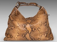 A gucci python tote bag 35 x 47 x 11 cm. (13.77 x 18 1/2 x 4.33 in.)