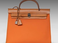 A hermès 'herbag' 31 in leather and orange toile, includes pouch, h 25 - w 31 - d 10 cm