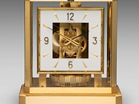 A jaeger-lecoultre 'atmos viii' clock, '70s the clock: 23 x 21 x 16.5 cm. (9.06 x 8.26 x 6 1/2 in.), the case: 26 x 24 x 19.5 cm. (10.24 x 9.44 x 7.67 in.)
