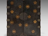 A japanese black and gold lacquered cabinet, mon symbols on the exterior and the 'three friends of winter' on the interior, meiji period (1868-1912), h 107,5 - 90 x 44,5 cm