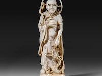 A japanese ivory okimono of the rakan handaka sonja with dragon, signed, meiji period (1868-1912), h 19 cm - 369g (+)