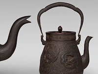 A japanese 'phoenix and dragon medallion' and a 'figure in a riverscape' cast iron tetsubin kettle, both signed, meiji period, total h 24,5 - 24,8 cm - afbeelding 2 van  8