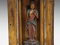 A japanese polychrome lacquered standing figure of sho kannon bosatsu, late meiji, total h 53 cm - fitted in a zushi portable shrine, h 57,5 - 22 x 21 cm