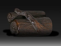 A japanese wooden okimono of timber logs, meiji, l 4 cm
