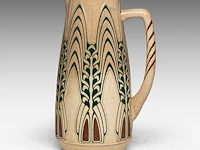 A jugendstil ceramic pitcher by peter behrens, ca. 1907 28 cm. (11.01 in.)
