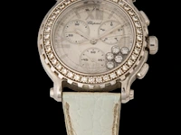A ladies' chopard happy sport chronograph, ref. 8499, stainless steel with diamond bezel and five floating diamonds