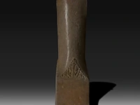 A large carved stone lingam, java, indonesia, 16thc