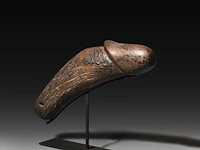 A large carved wooden palad khik, 19thc, l 30 cm