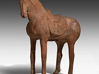 A large chinese pottery figure of a horse, tang dynasty, h 49,3 - l 44 cm (+)