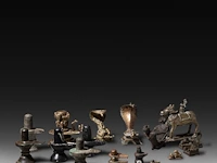 A large collection of bronze traditional indian lingams