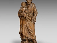A large limewood sculpture of saint joseph carrying the young christ, 19thc 125 cm. (49.21 in.)