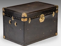 A leather-upholstered travel trunk by maison goyard 53 x 80 x 52 cm. (20.87 x 31 1/2 x 20.46 in.)