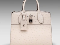 A louis vuitton ivory ostrich city steamer pm handbag, with silver hardware, h 23,5 - w 27 - d 12,5 cm