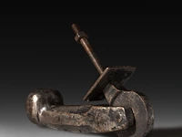 A massive iron phallic door knocker, french 25 cm. (9.83 in.)